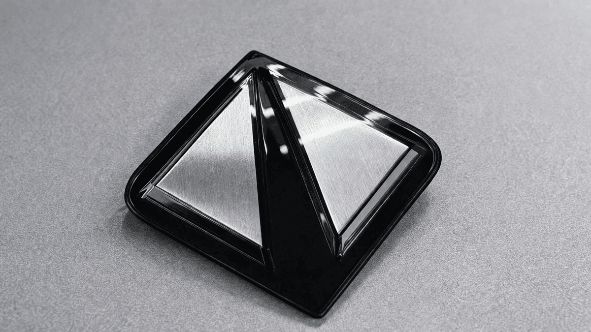 PVD coated emblem application