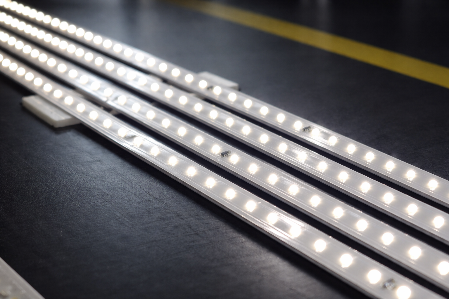 Integrated LED automotive lighting system with blue illumination